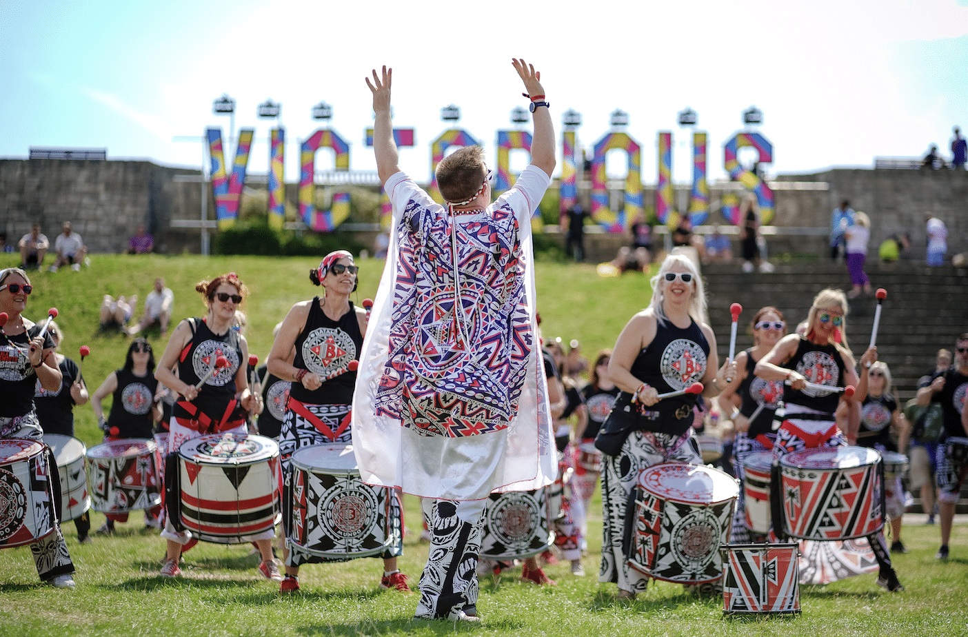 Photograph of drumming group Batala performing on Castle Field during Victorious Festival 2022